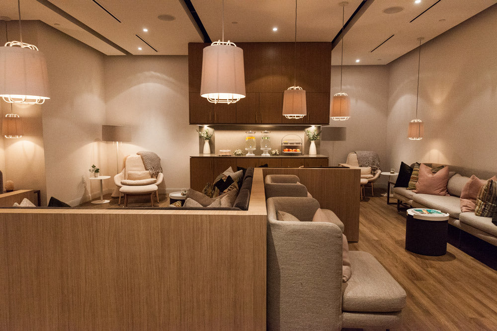 Modern interior design of a lounge or cafe with wooden furniture and decorative elements.